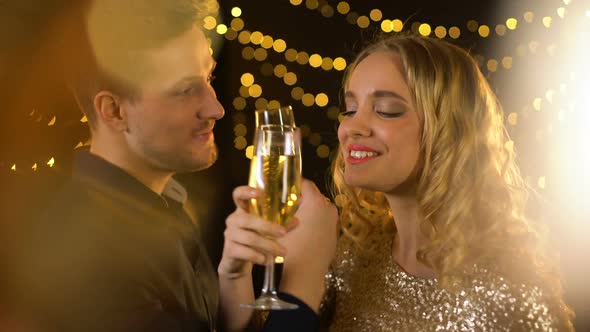 Happy Young Couple Drinking Champagne Brotherhood, Couple Having Fun at Party