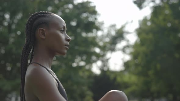 Woman with Afro Braids Having Outdoors Workout