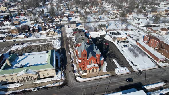 Drone view of Saint Mary's Roman Catholic Church, Warren, Ohio. Winter view of Warren buildings