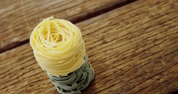 Close-up of green and yellow fettuccine
