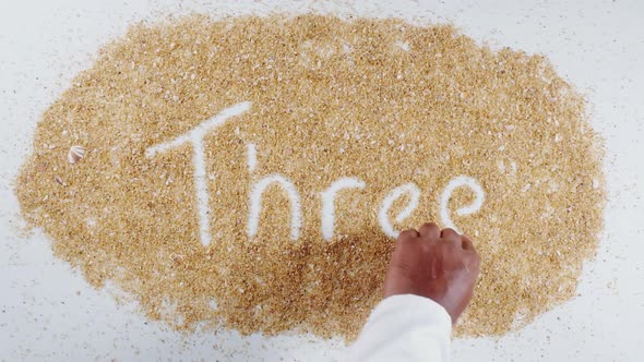 Hand Writes On Beach Sand Three