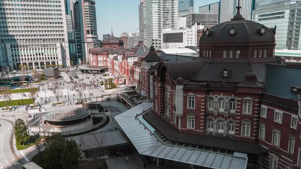 time lapse of Tokyo station, a railway station in the Marunouchi business district in Tokyo, Japan