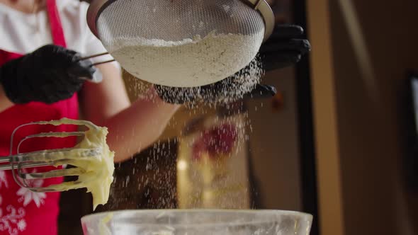 Slow Motion of Falling Sugar on Yeast Dough