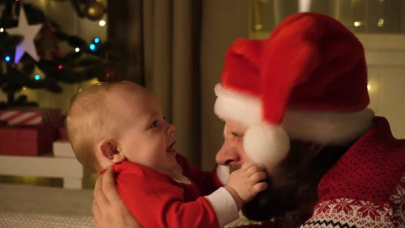 Father and Little Child Have Fun on Christmas Holidays