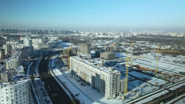 City quarters. Multi-story houses. Winter cityscape.