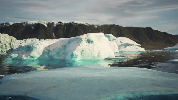 Antarctic Iceberg Landscape with Glacier Running Into Ocean