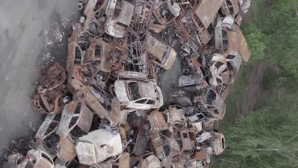 Vertical Video of the Consequences of the War in Ukraine  Destroyed Cars