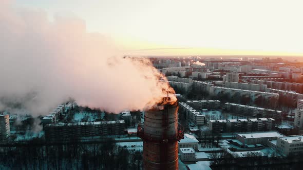 Deep Smoke Coming Out of a Manufacturing Pipe