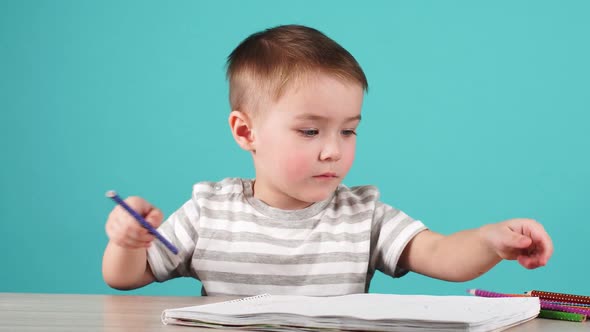 Boy Drawing a Picture for Father Day. Loving Son Makes a Gift for His Father