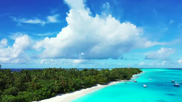 Luxury aerial island view of a summer white paradise sand beach and aqua turquoise water background 