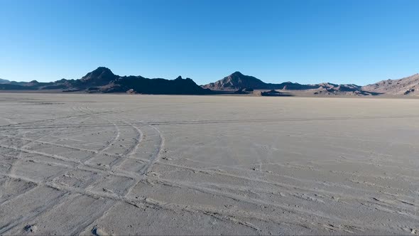 Flying over the Bonneville Salt Flats in Northwestern Utah reveal white salt and tire tracks.