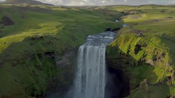 Aerial view Skogafos Waterfall in Sunny Evening Iceland