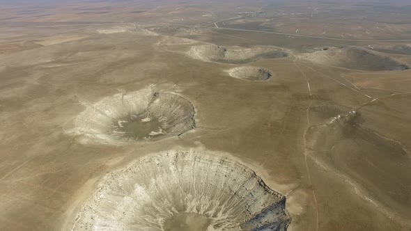 Giant Meteor and Sinkhole Pits on Mainland Surface of Earth