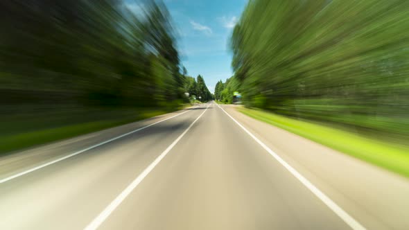 Point of View Driving on Country Route Through Small Suburbia Town High Speed Hyperlapse 