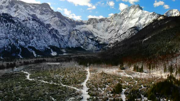 Beautiful Landscape with Mountains and Forest in Winter