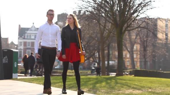 Business people man and woman meeting and walking together