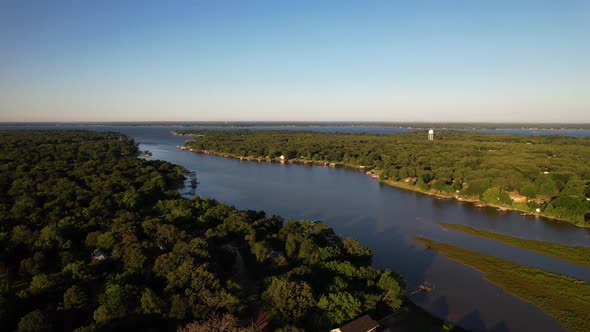 Aerial footage of Cedar Creek Lake in Texas on the east side of lake