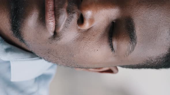 Vertical View Serious Half Male Face of Focused Adult African American Man Guy Millennial Model