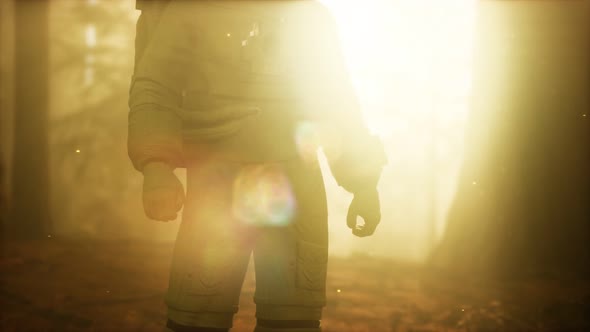 Lonely Astronaut in Dark Forest alt
