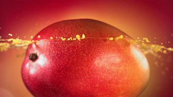 Mango Slice Falling and Splashing on Yellow Pink Background