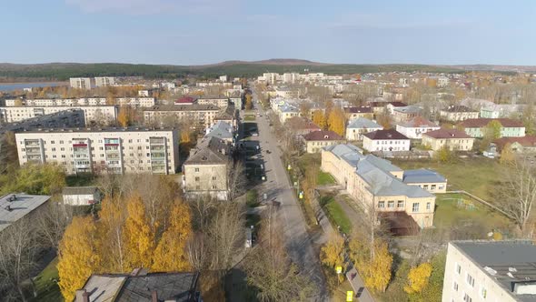 Aerial view of A provincial Russian city with low buildings. Autumn sunny day. 37