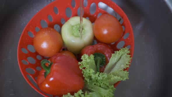 Washing vegetables.