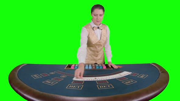 Casino Croupier Smoothes and Gathers the Poker Cards. Green Screen. Slow Motion