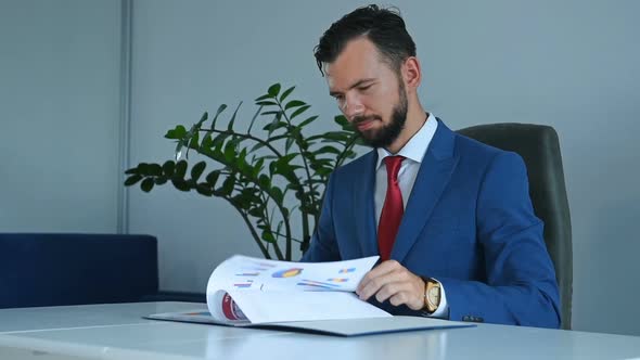 Director Signs Document.