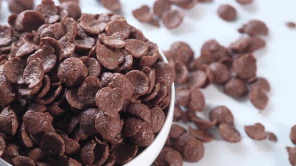  Top View of Chocolate Corn Flakes in a Bowl on White 