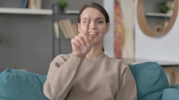 Portrait of Woman Pointing and Inviting