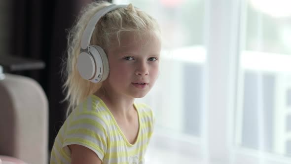 Portrait Beautiful Smiling Girl in Headphones