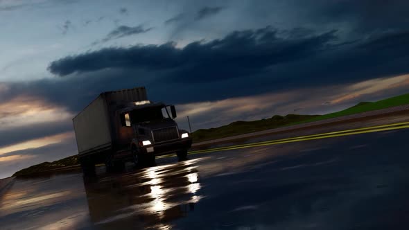 Truck Moving On The Road In Rainy Weather alt