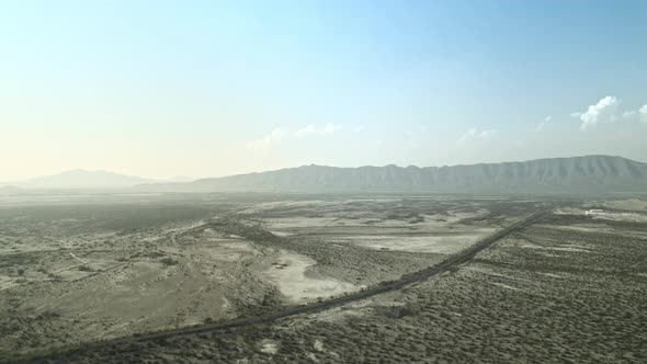 DRONE DAY CLOUDY NORTH COAHUILA MEXICO HIGHWAY SEMI-DESERT MOUNTAIN LA AZUFROSA AREA