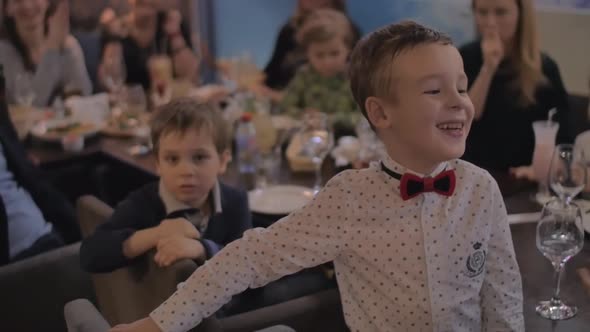 Child receiving congratulations on his birthday