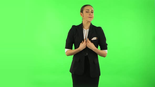 Young Tired Woman Cooling Herself By Her Hand, Suffering From High Temperature Weather. Green Screen