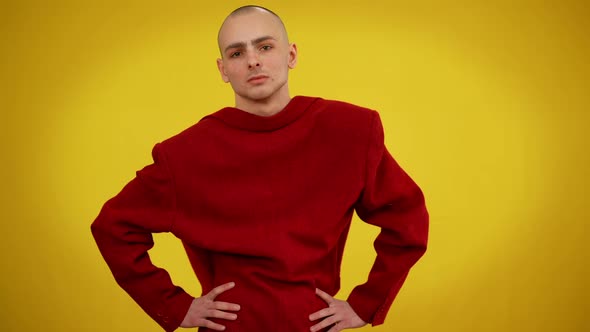 Young Male Queer Person Turning to Camera Putting Hands on Hips