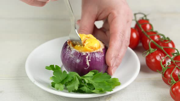 Woman Tries the Original Dish with a Fork