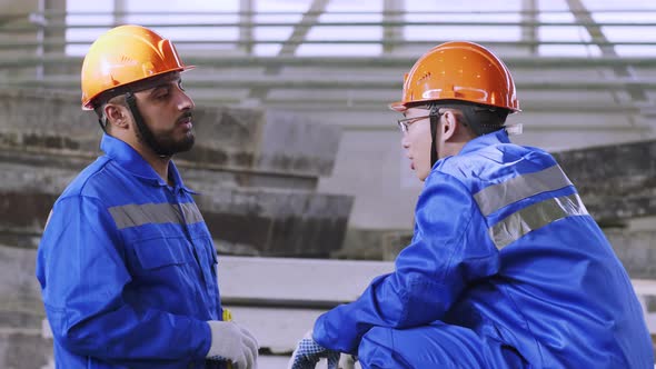 Factory brigade talking at workplace