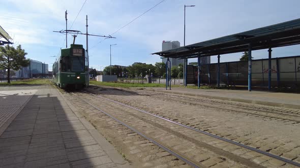 Green tram drive near central train station in Sofia, Bulgaria