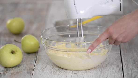 Electric Mixer. Beat the Cream in a Mixing Bowl To Make Cream Dessert.