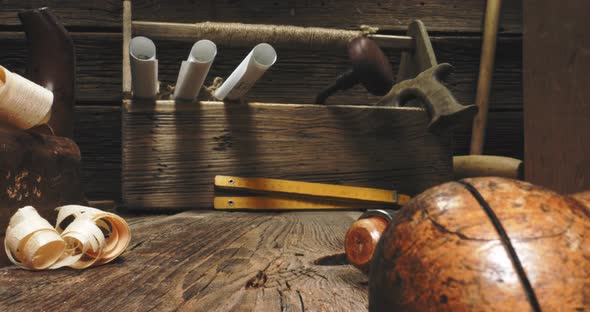 Retro joinery workbench with chisels, tampers and planes.