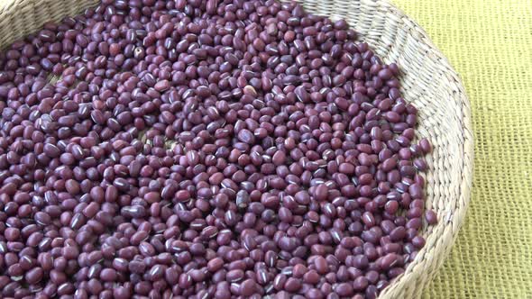 Fresh adzuki beans. Red beans in basket (Vigna angularis)