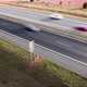 Aerial Drone Hyper Lapse Footage of Cars Moving Fast on Busy Highway or Motorway at Sunset - VideoHive Item for Sale