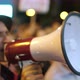 White European Male in Fedora Hat on Demonstration Rally Talking with Bullhorn - VideoHive Item for Sale