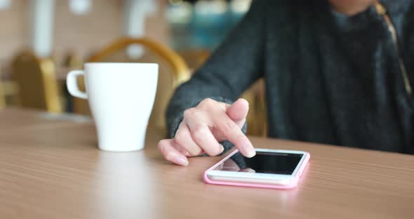 Woman Use of Mobile Phone in Coffee Shop