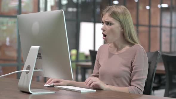 Stressed Woman Get Shocked While Working on Computer