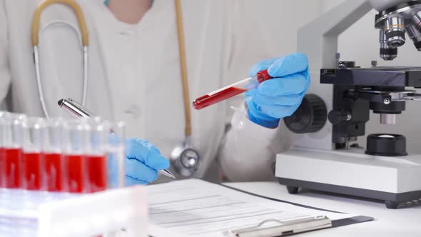 The Laboratory Assistant Conducts Tests and Analysis in the Laboratory