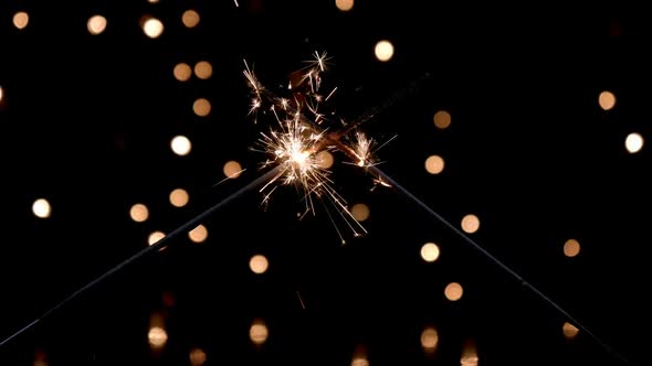 Two Sparklers Burning