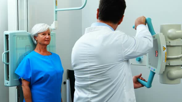 Senior woman undergoing an x-ray test