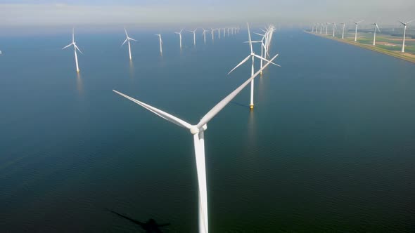 Windmill Park in the Ocean Drone Aerial View of Windmill Turbines Generating Green Energy Electric